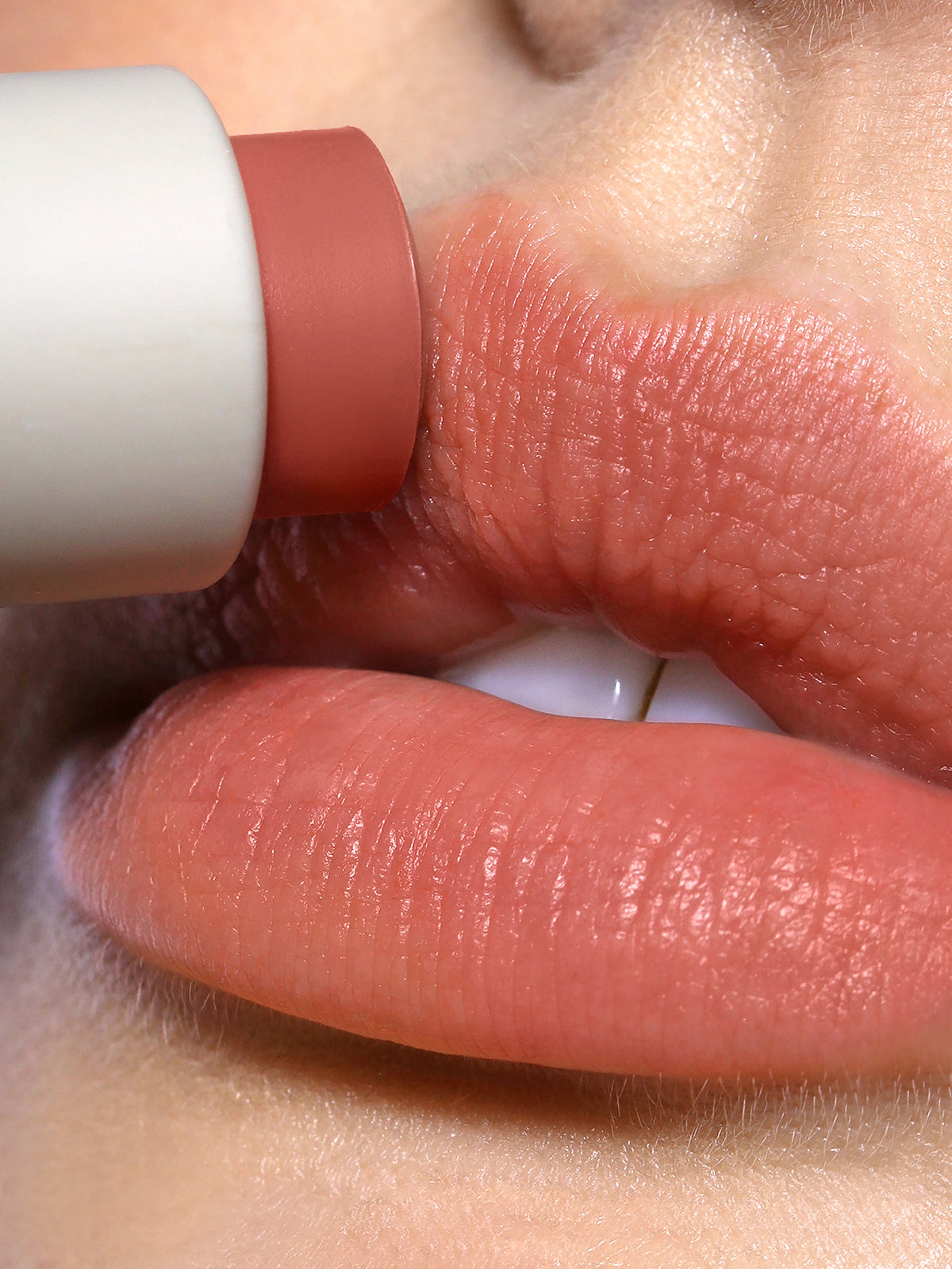 REYF LIP BLUSH IN SHADE AMBER CLOSE UP APPLICATION