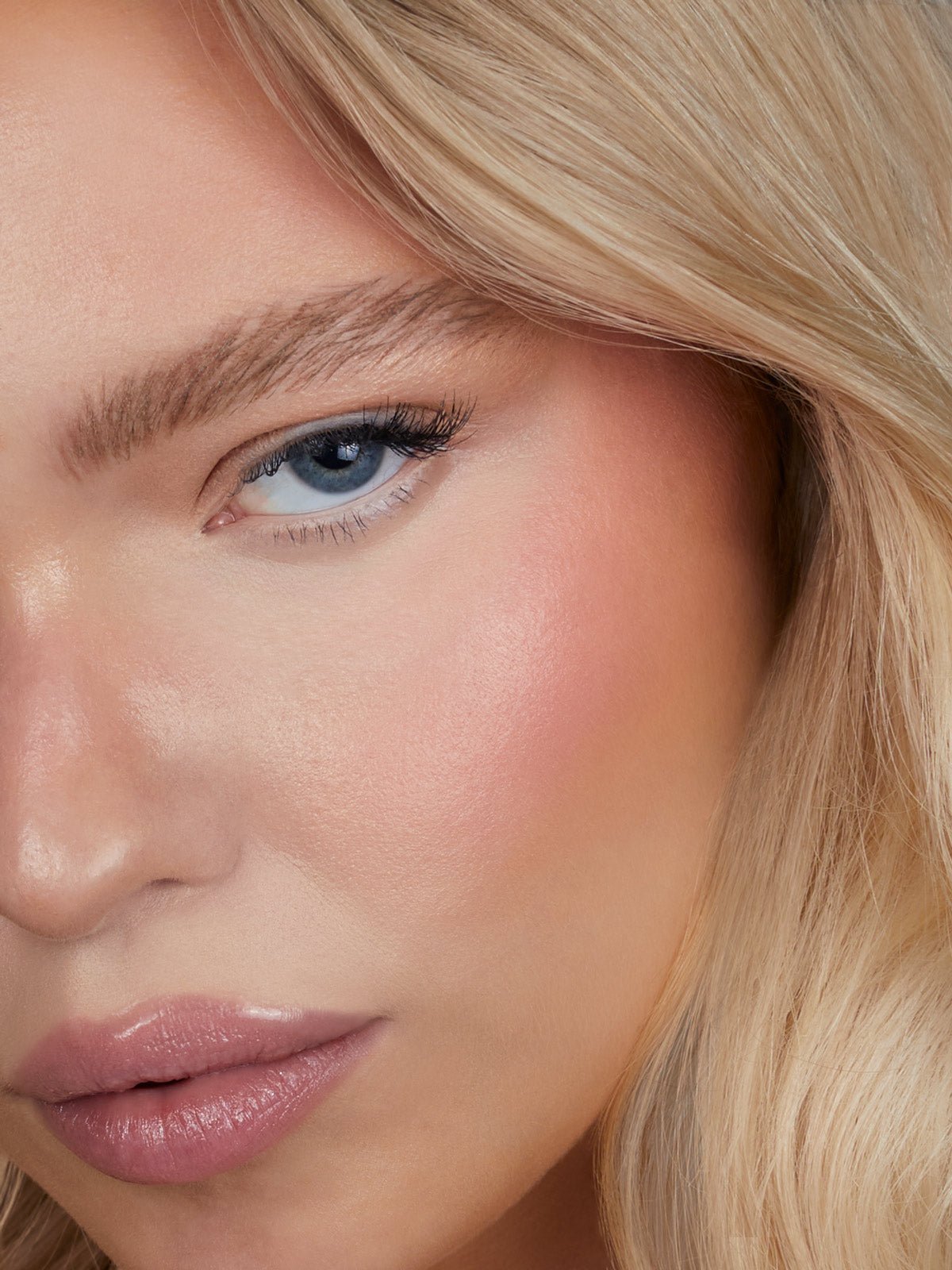 REFY CREAM BLUSH IN SHADE ROSE ON MODEL