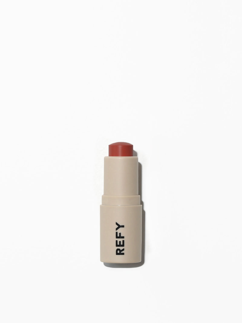 FRONT IMAGE OF REFY LIP BLUSH IN SHADE AMBER. A LIGHT NEUTRAL ORANGE 