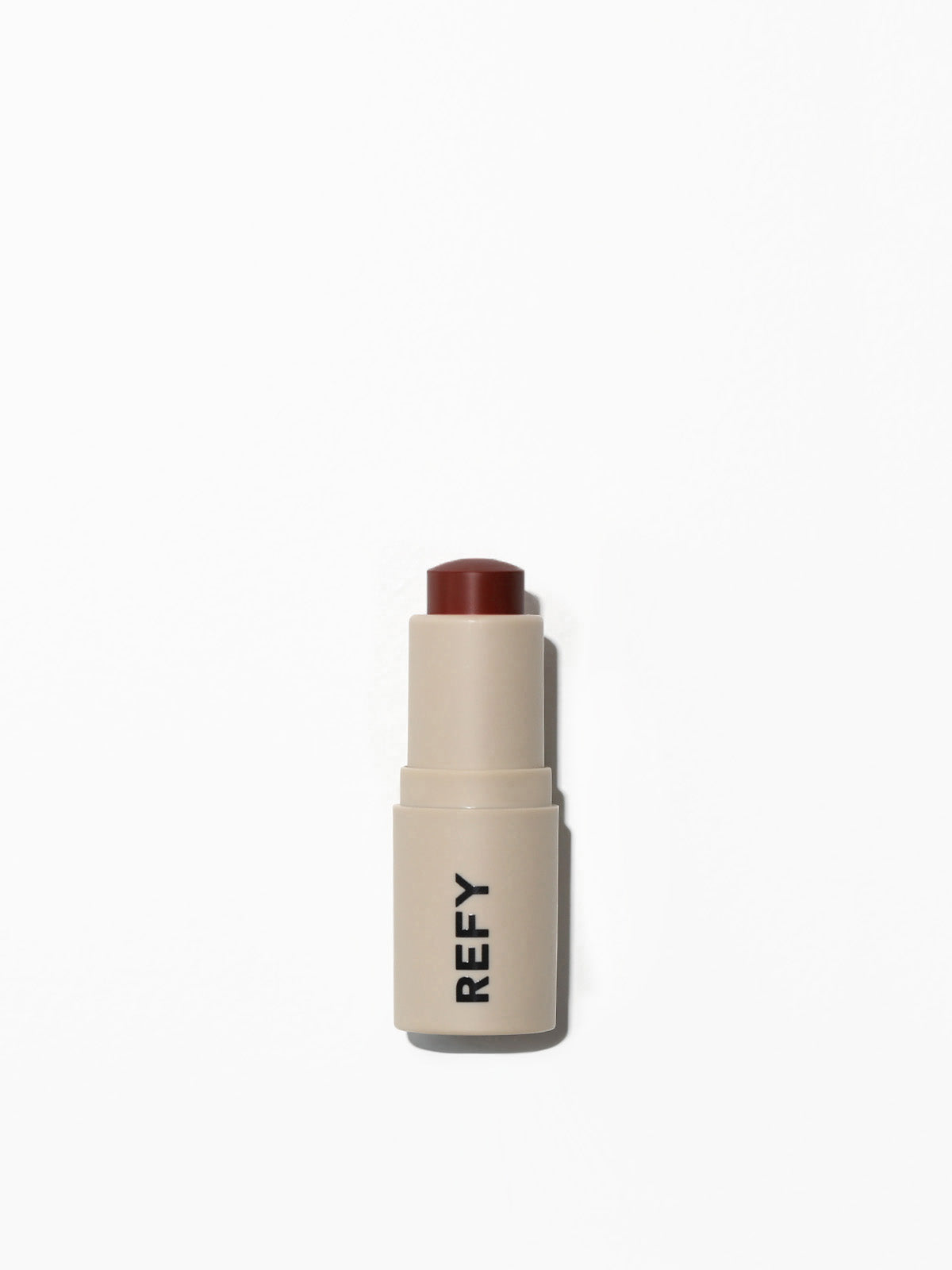FRONT IMAGE OF REFY LIP BLUSH IN CNAYON. A DEEP, REDDY BROWN.