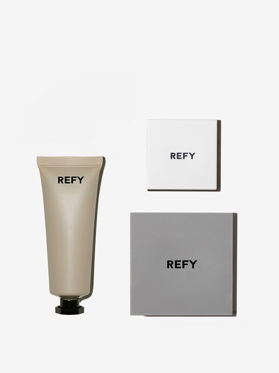 FRONT IMAGE OF REFY FACE SET. CONTAINS CREAM BRONZER, CREAM BLUSH AND GLOSS HIGHLIGHTER