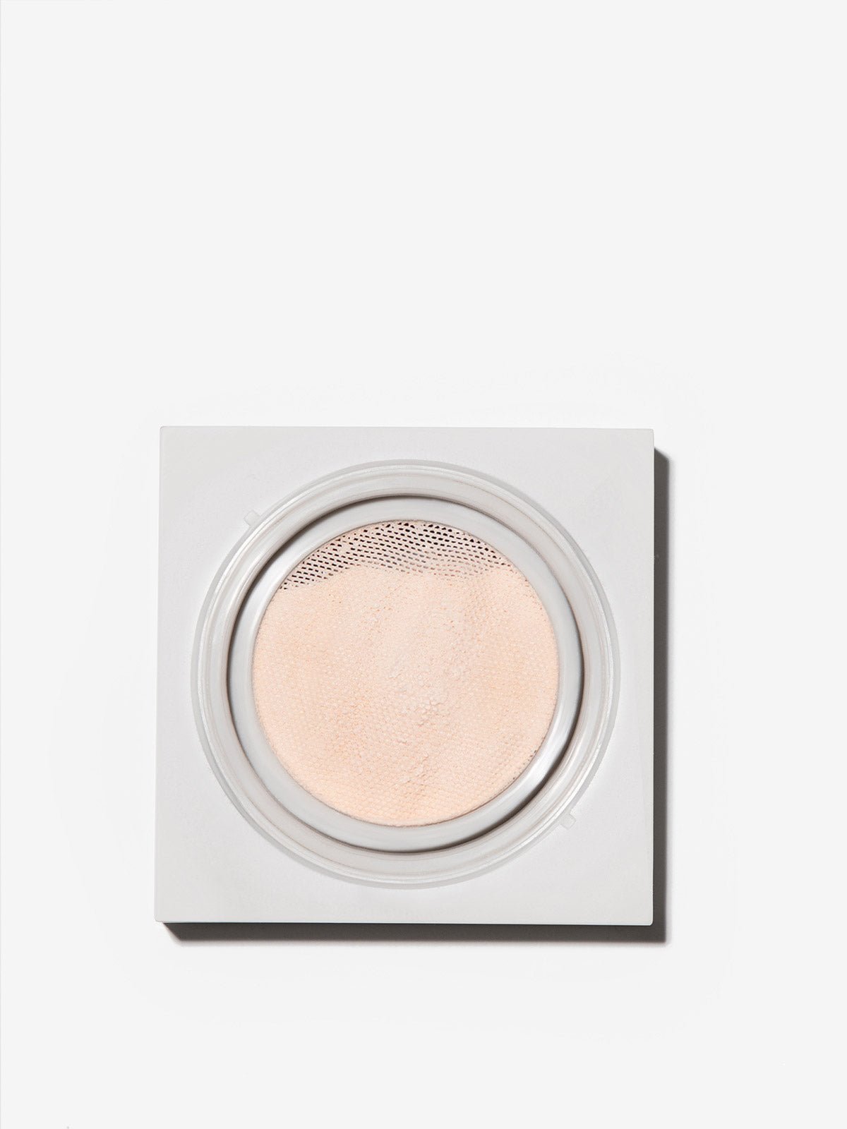 FRONT IMAGE OF REFY SKIN FINISH IN SHADE 02. TRANSLUCENT POWDER WITH PINK UNDERTONE